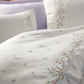 exquisite pink, blue,green floral embroideries on white duvet cover and shams