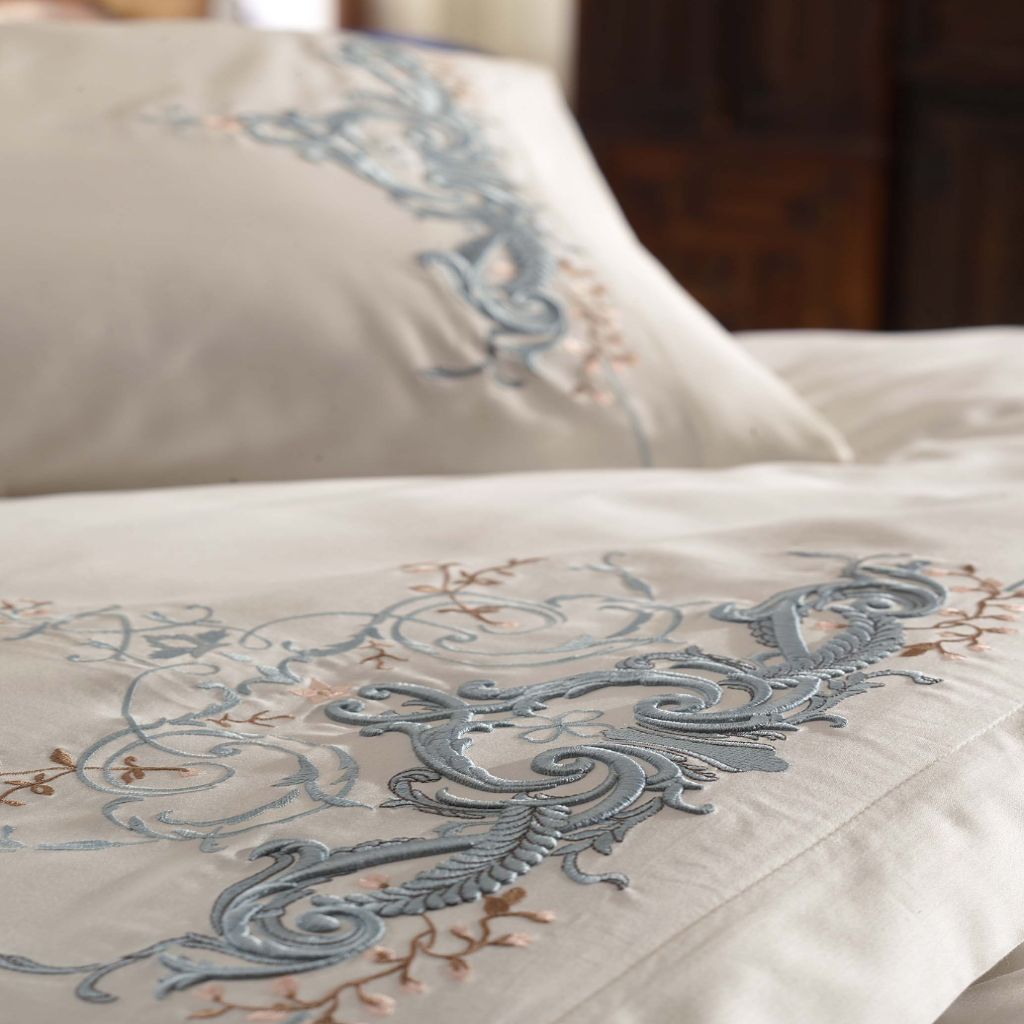 Royal blue color embroideries on white, cotton-sateen duvet cover and shams