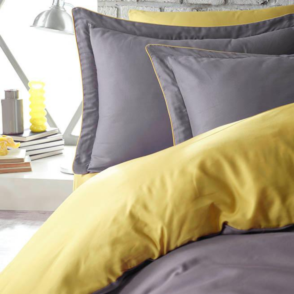 Duvet cover in mustard-yellow and grey color that combines with yellow and grey pillowcases 