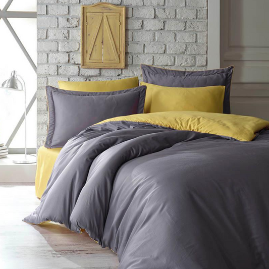 Modern, minimalist bedroom designed with mustard yellow-grey colored bed linen set