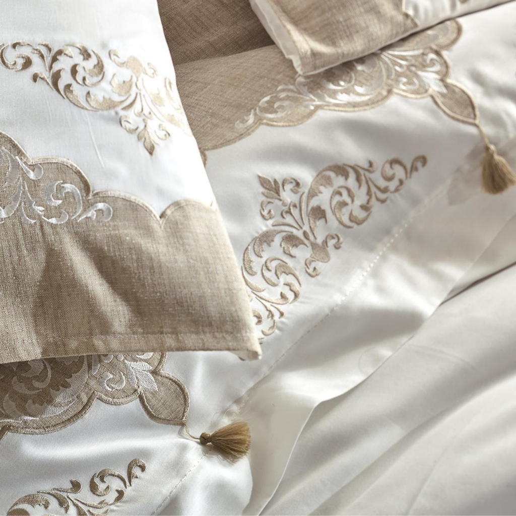 Bronze color, baroque design embriodery and tassels on white duvet cover and shams