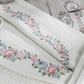 Ecru color women`s robe and collars are decorated with floral embroideries and lace