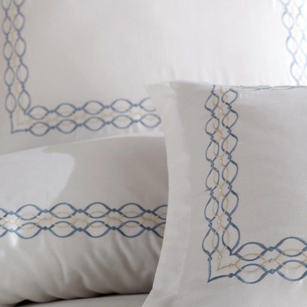Elegant blue and silver color embroideries on cotton-sateen pillowcases