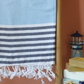 Turkish beach towel has blue and navy stripes