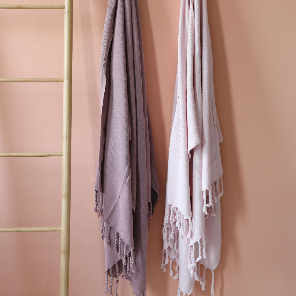 Powder-pink and dusty-rose colored 2 Turkish towels has hand-tied tassels
